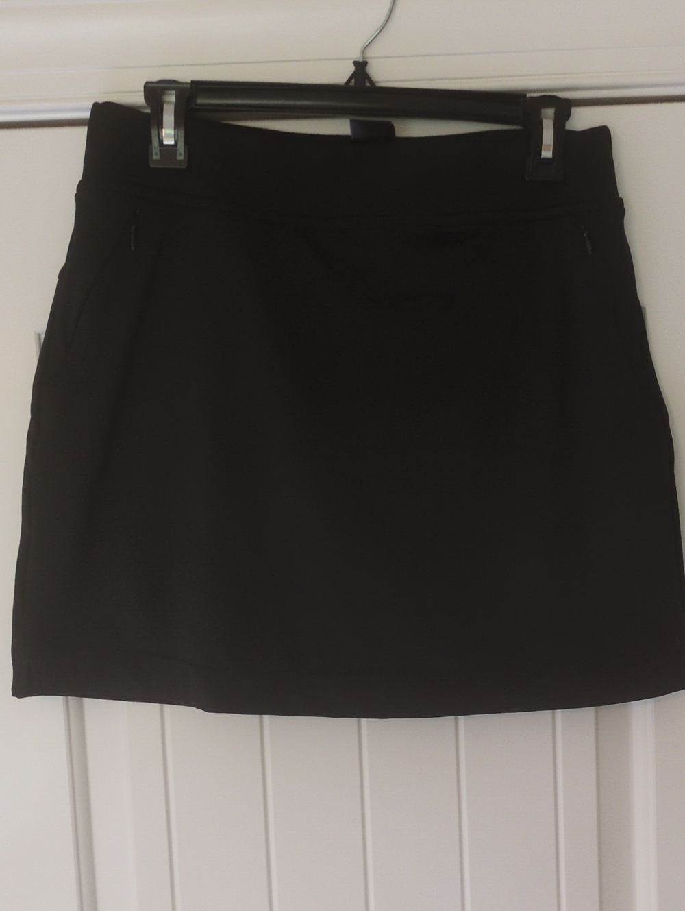 Sleek Black Sport Mini Skort with Zipper Pockets
